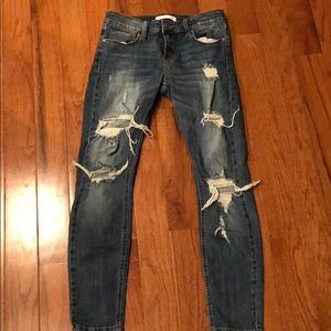 Distressed skinny jeans